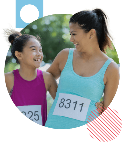 adult and child at charity marathon